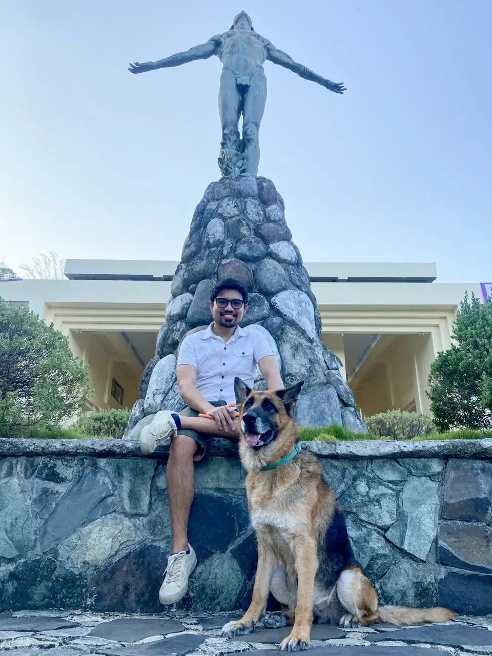 Atty. Maghopoy at the UP Oblation with his dog
